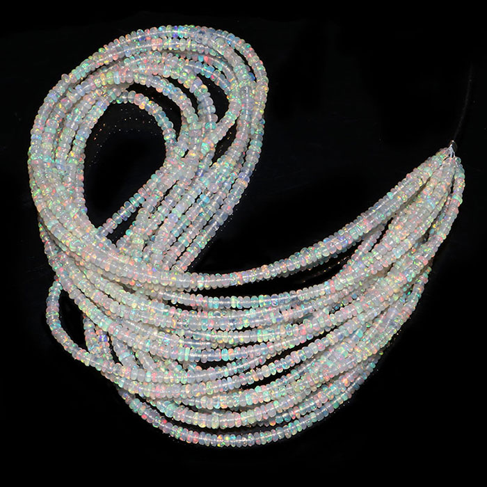 manufacturer of Ethiopian Opal Plain Beads Strands for jewellery