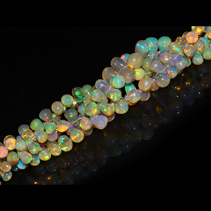 suppliers of Ethiopian Opal Plain Beads Strands at best price