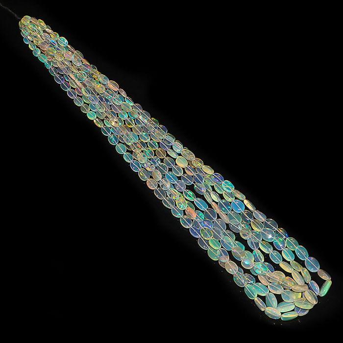 manufacturer of Ethiopian Opal Plain Beads Strands for jewellery