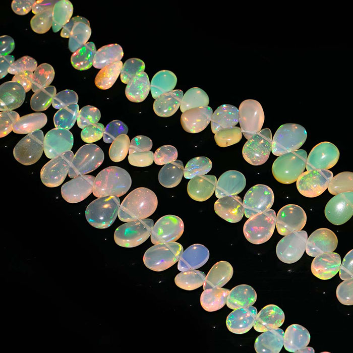 suppliers of Ethiopian Opal Plain Beads Strands at best price