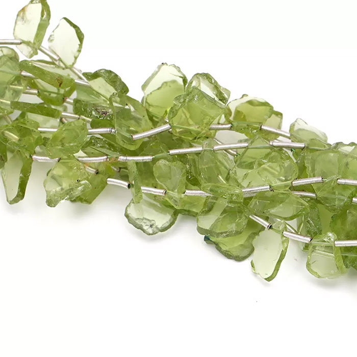 suppliers of Peridot Plain Beads Strands at best price
